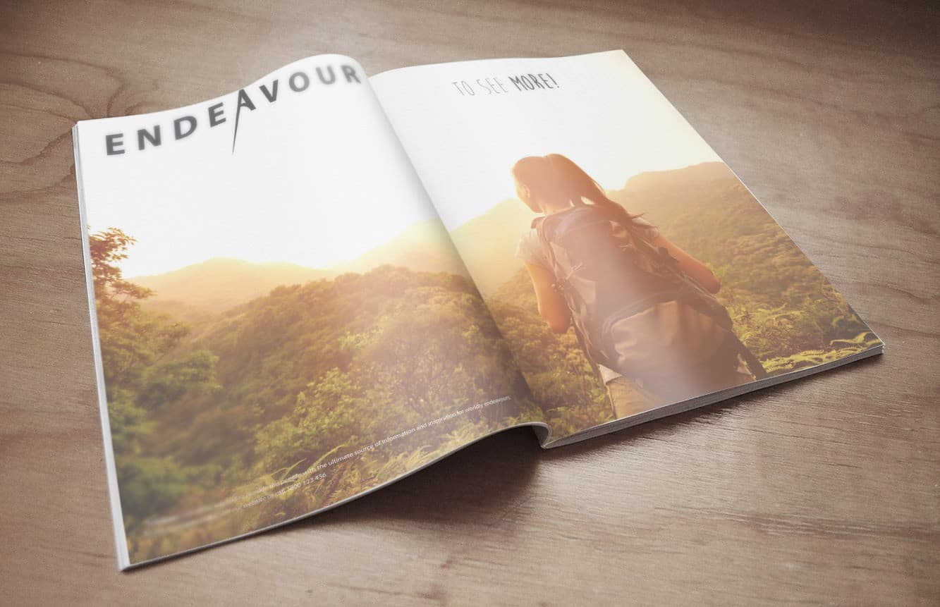 Endeavour magazine design created by The Tasmanian Web Company in Devonport, Tasmania. Woman overlooking forest covered mountains in light colours with the brands natural vibe.